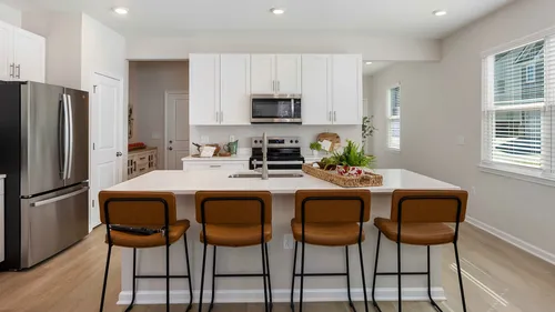 Kitchen with white cabinets and stainless steel appliances