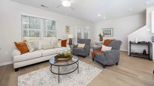 Living room with couch and chairs