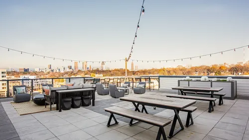 rooftop dining area with skyline view