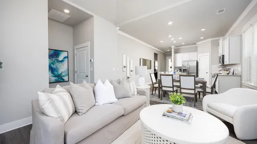 Furnished living room, dining room and kitchen