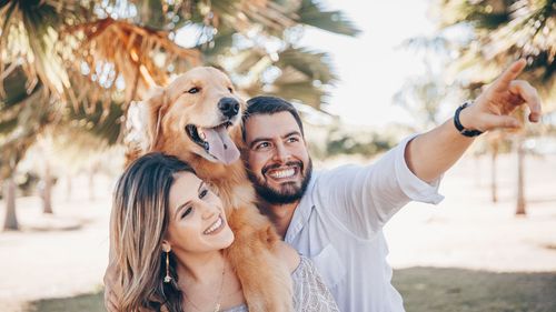 Man and woman with dog