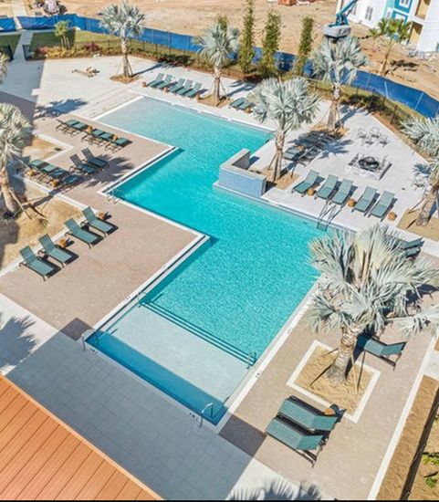 aerial shot of exterior pool in daytime
