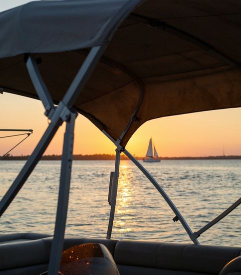 boat on water at sunset