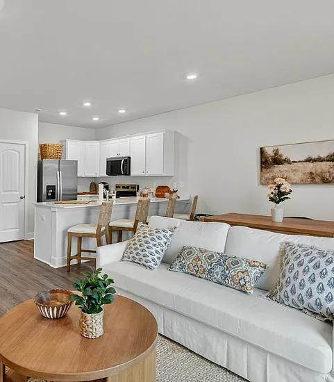 Virtually staged dining room and living room