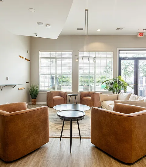 Clubroom with chairs and couches