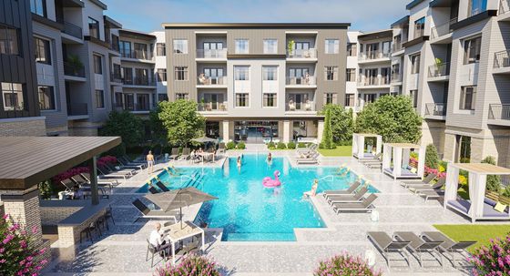 Modern apartment complex showcasing a luxurious pool area with sun loungers, cabanas, and vibrant landscaping, perfect for relaxation and social gatherings.