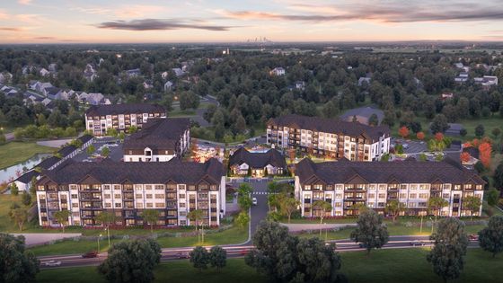 Charming residential complex nestled in lush greenery, featuring modern architecture and vibrant community spaces, ideal for urban living.