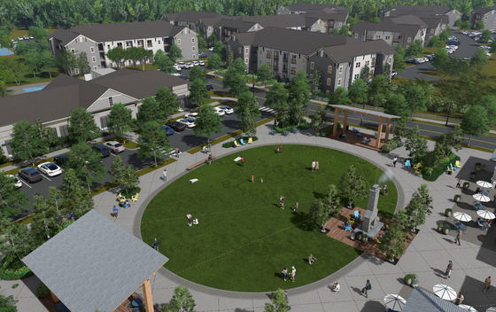 Charming aerial view of a modern apartment community with spacious green park, ideal for family gatherings and outdoor relaxation.