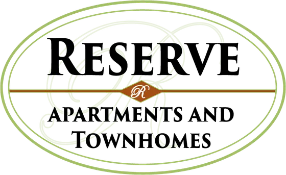 Reserve Apartments and Townhomes logo with elegant design in green and brown.