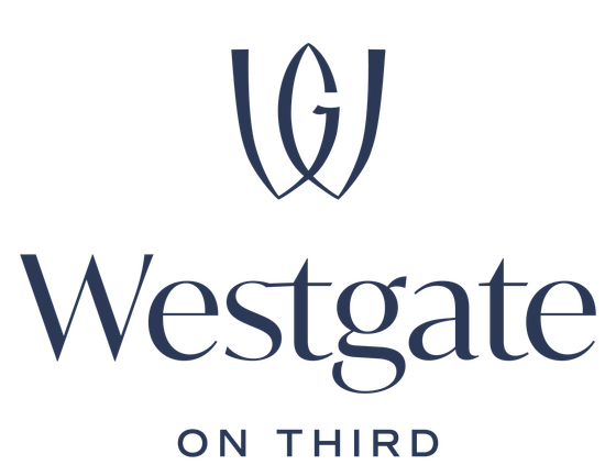 Elegant Westgate On Third logo in dark blue, featuring a sophisticated monogram design.