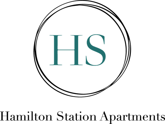 Elegant logo for Hamilton Station Apartments featuring stylish 'HS' lettering in a sleek circular design.