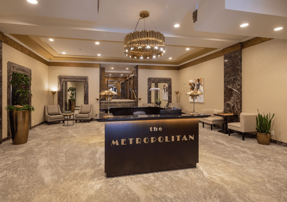 Elegant lobby interior with stylish seating, modern lighting, and chic marble accents.