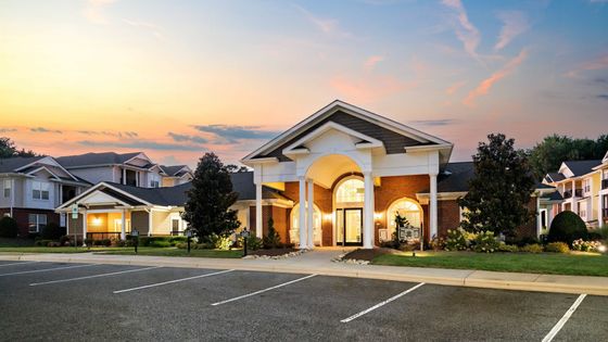 Abberly Woods Apartment Homes by HHHunt Pool at Dusk