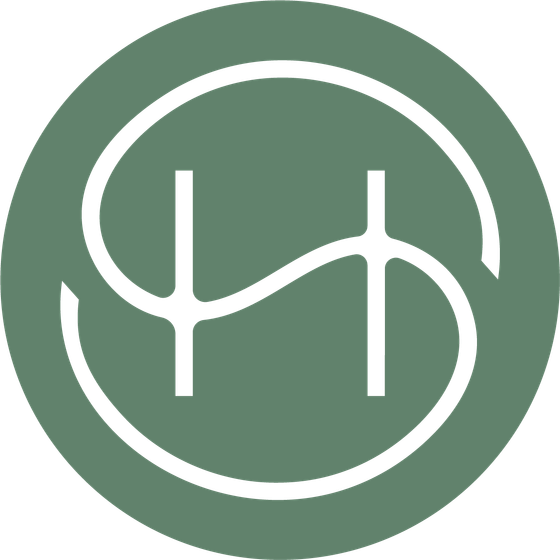 Elegant shield emblem with intricate line design in green tones, embodying sophistication and style.