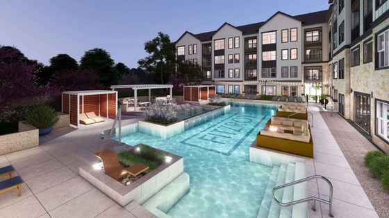 Luxurious apartment community featuring a beautifully designed swimming pool area with cozy lounging spaces and stylish cabanas.