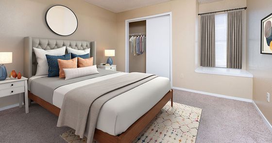 Inviting bedroom with a plush bed, elegant decor, soft lighting, and a cozy atmosphere.