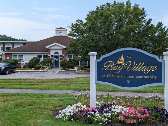 Bay Village sign and community building