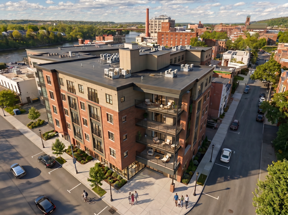 Chic urban apartment building with spacious balconies, nestled in a vibrant neighborhood with scenic river views.