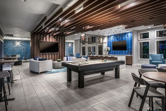 Clubhouse with tvs and pool table