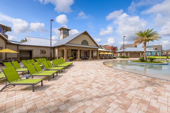 Knightshade, exterior, swimming pool, green lounge chairs, clubhouse, palm trees