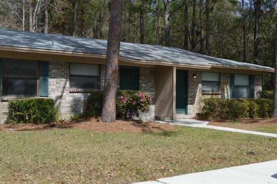Southwest Villas, exterior, single story building, grass, trees