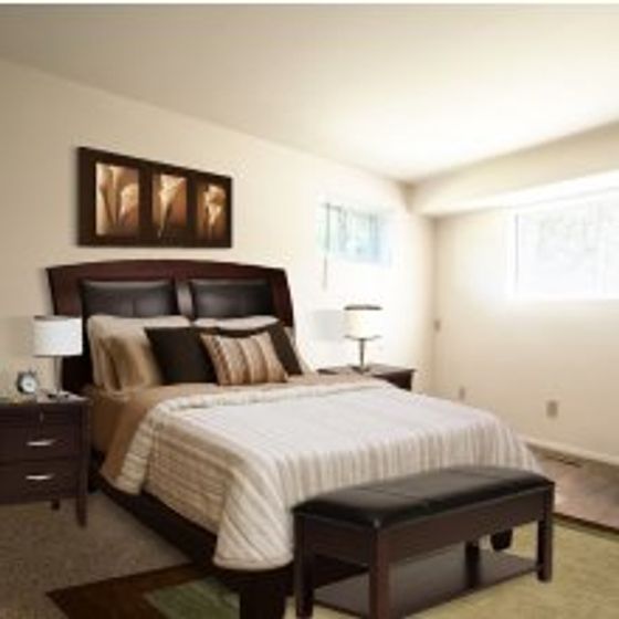 crain court apartments bedroom with furniture