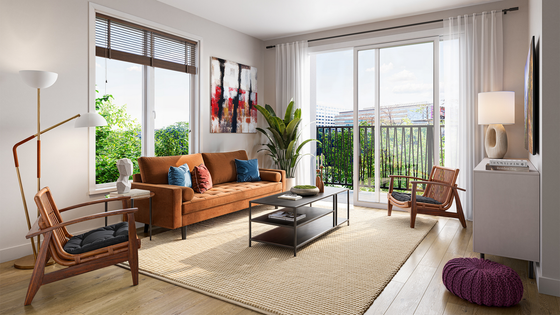Bright modern living room with a rust-colored sofa, wooden chairs, and a large window leading to a balcony.