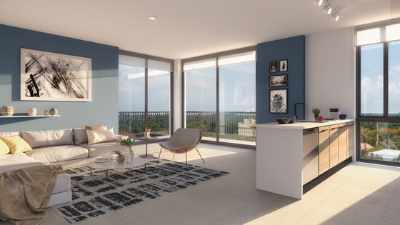 Modern living room with expansive windows, stylish furniture, and sleek kitchen island in a bright, open-concept apartment.