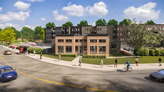 Modern apartment complex with stylish brick facade, surrounded by lush greenery and vibrant community amenities, showcasing urban living at its finest.