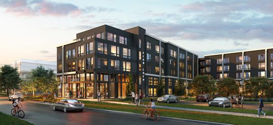 The exterior of Elan LoSo Apartments in Southwest Charlotte, NC, featuring a modern facade with large windows.