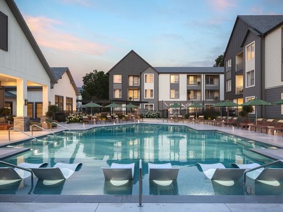 Rendering of pool courtyard with lounge chairs