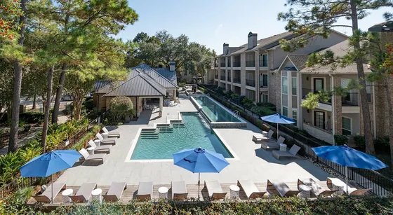 Exterior image of apartments and a view of the luxury pool
