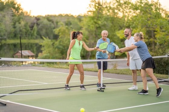 Residents playing tennis