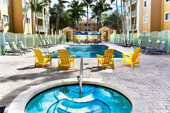 Pool Deck, with tables, lounge chairs and a jacuzzi