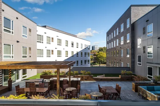 arrow apartments minneapolis building exterior rooftop courtyard
