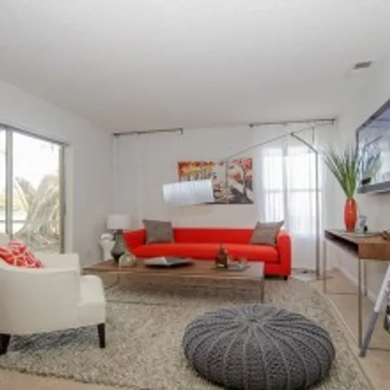 Spacious living room with windows | Advenir at Banyan Lake