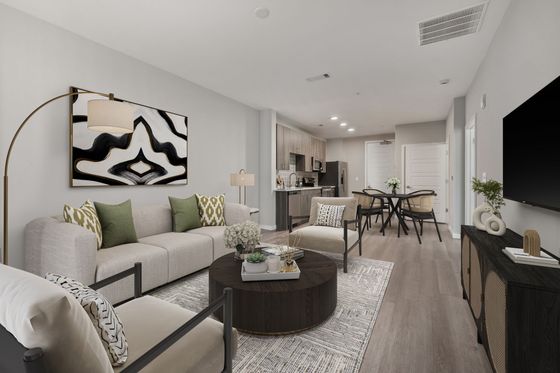 Spacious clubhouse with large bright windows and cozy fireplace in North Raleigh