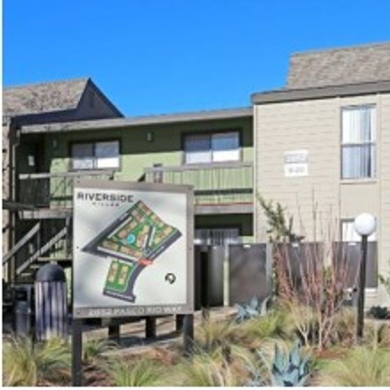 A view of the building exterior featuring our community mail boxes and site map.