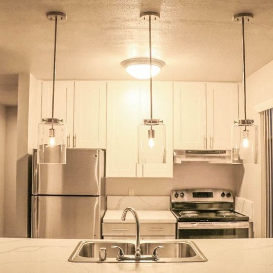 Kitchen with stainless steel appliances and modern finishes.