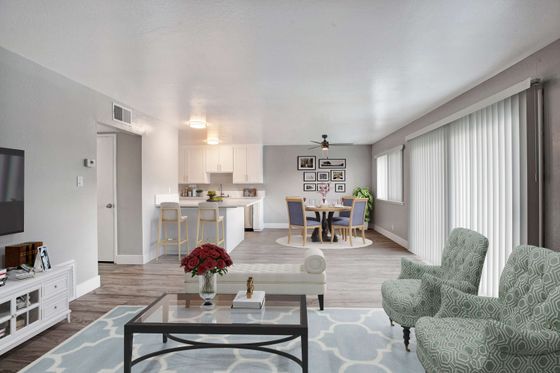 Open floorplan with new flooring and quartz countertops