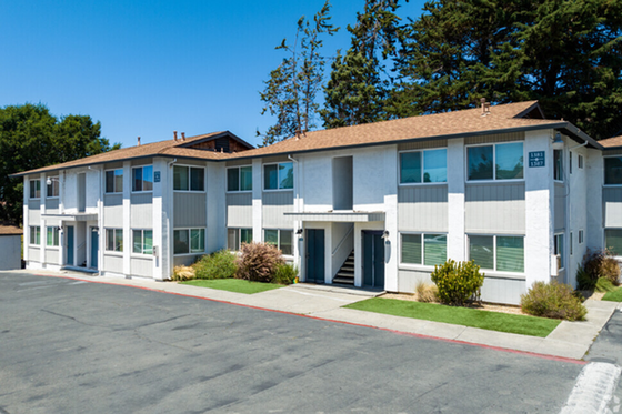 exterior of building, paint is white with blue accents