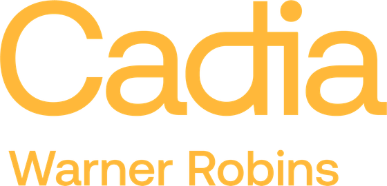 Cadia Warner Robins logo featuring bold, modern typography in vibrant orange.