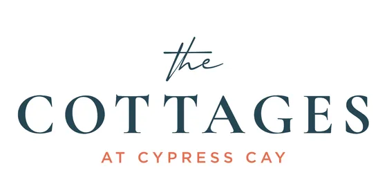 Elegant logo for The Cottages at Cypress Cay, featuring sophisticated font in dark blue and warm coral.