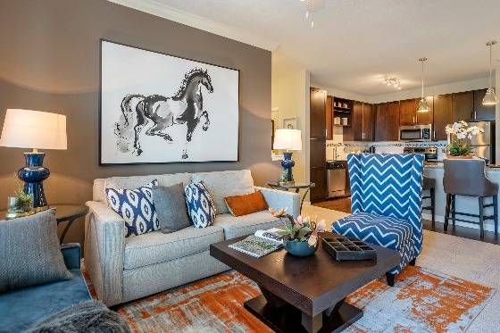 Open living concept with kitchen island and pendant lighting