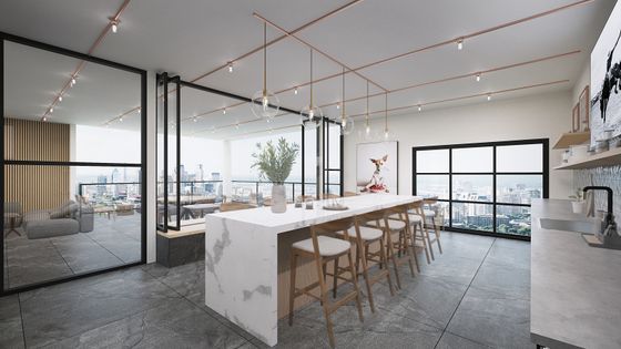 Resident Clubhouse with Dallas city views, floor-to-ceiling windows, a marble waterfall island, skydeck, and modern finishes at Lantower Midtown.