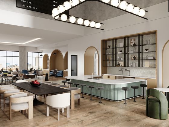 Resident lounge with stylish finishes and self-serve table tap system at Lantower West Love.
