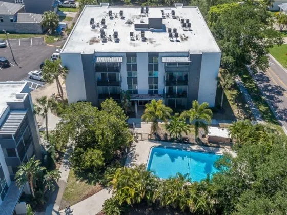 Overhead view of building and swimming pool