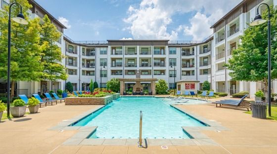 Resort-Style Pool and Expansive Sundeck at RiverHouse Apartments in Little Rock, AR