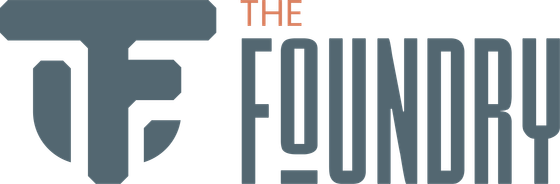 The Foundry logo in modern industrial design featuring bold typography and sleek shield emblem.