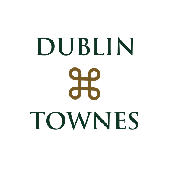 Elegant Dublin Townes logo featuring a sophisticated gold emblem.